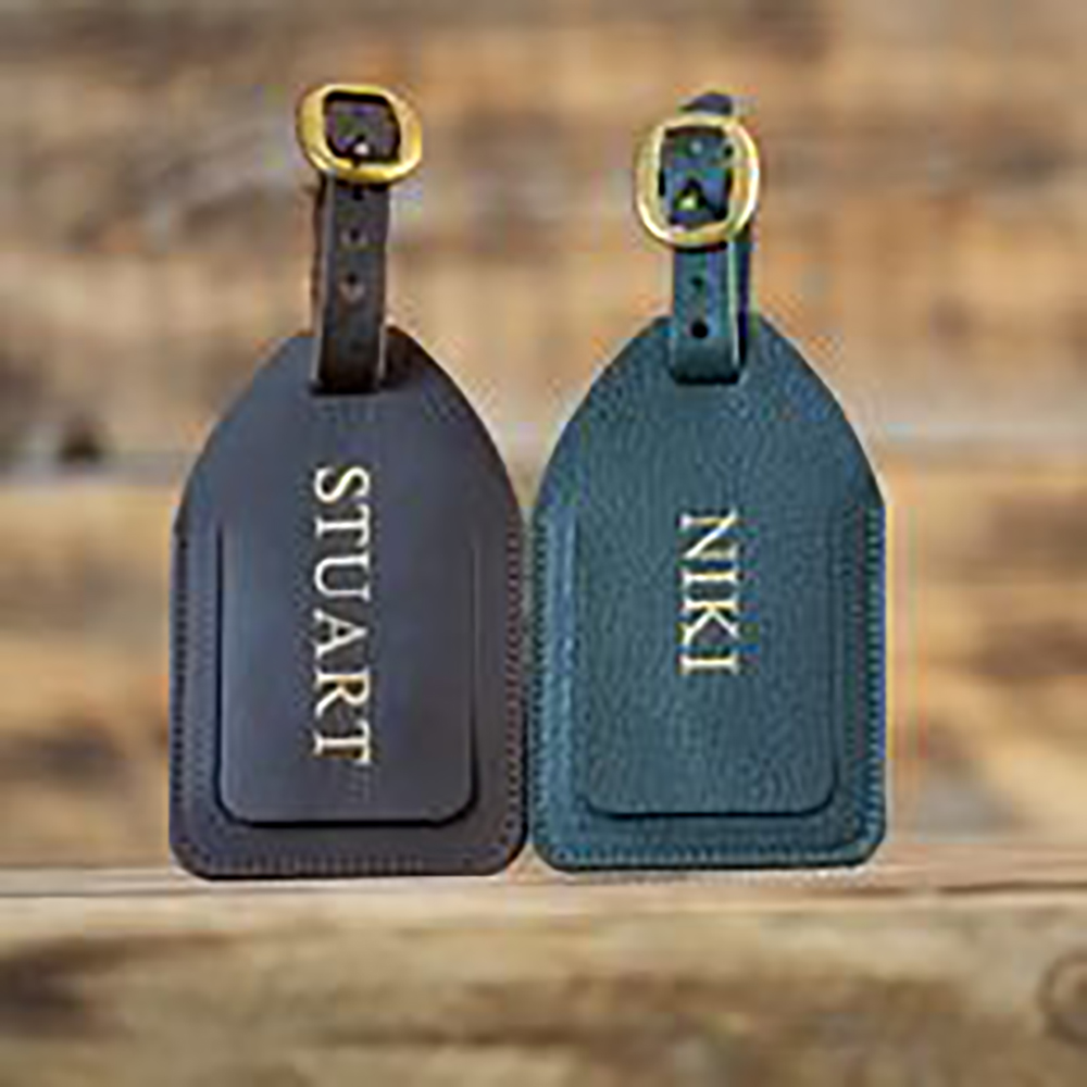 luggage tags Nelson Were