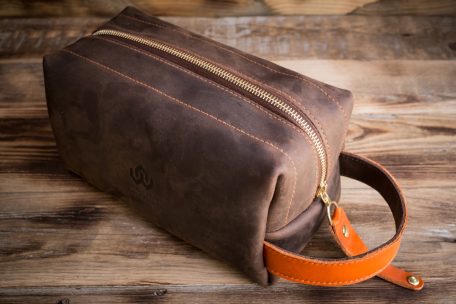 Travel wash bag- brown with contrast handle.