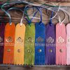 Group of coloured leather tags